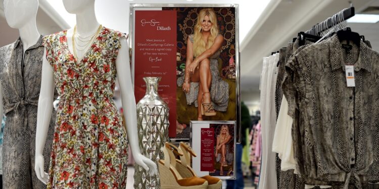 Jessica Simpson apparel on display in a department store.
