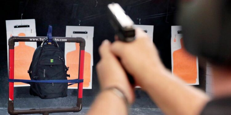A TuffyPacks bulletproof backpack stands up to the test at a shooting range.