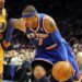 Knicks' Carmelo Anthony drives to the basket past Hornets Trevor Ariza during the first quarter of a game in 2011.