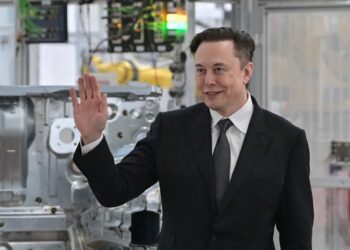 FILE - Tesla CEO Elon Musk attends the opening of the Tesla factory Berlin Brandenburg in Gruenheide, Germany, Tuesday, March 22, 2022. Shares of Tesla and Twitter have tumbled this week as investors deal with the fallout and potential legal issues surrounding Tesla CEO Musk and his $44 billion bid to buy the social media platform. Of the two, Musk's electric vehicle company has fared worse, with its stock down almost 16% so far this week to $728.