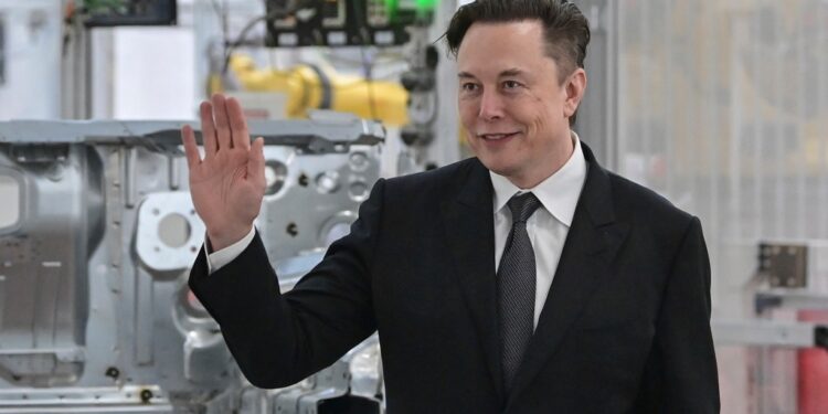FILE - Tesla CEO Elon Musk attends the opening of the Tesla factory Berlin Brandenburg in Gruenheide, Germany, Tuesday, March 22, 2022. Shares of Tesla and Twitter have tumbled this week as investors deal with the fallout and potential legal issues surrounding Tesla CEO Musk and his $44 billion bid to buy the social media platform. Of the two, Musk's electric vehicle company has fared worse, with its stock down almost 16% so far this week to $728.