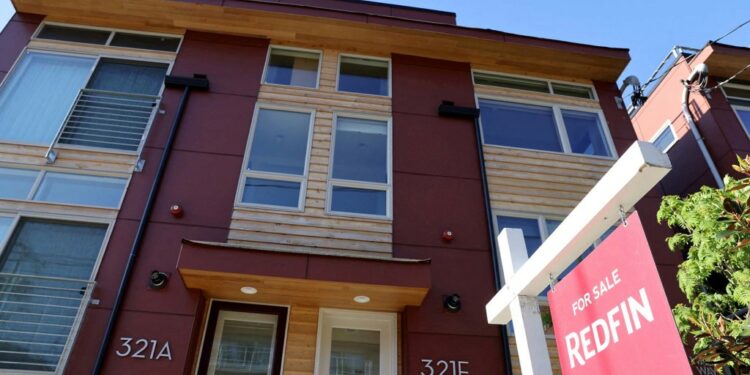 A for-sale sign on home.