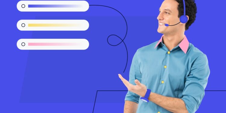 guy wearing a phone headset pointing at blocks