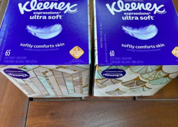 Two boxes of Kleenex tissues are displayed.