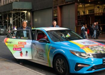 Rideshare car with ads.