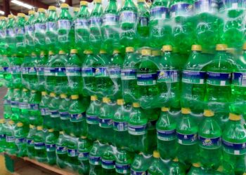 Green plastic bottles of Sprite