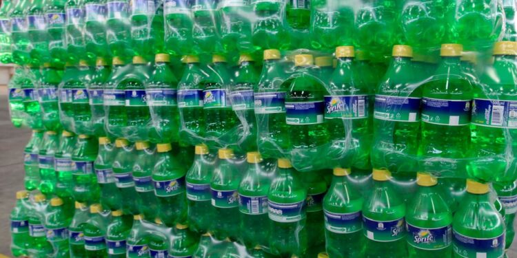 Green plastic bottles of Sprite