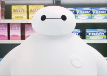 In the scene, the protagonist, the Marvel Comics superhero nurse robot Baymax, is in the aisle of a supermarket in the fictional town of San Fransokyo browsing women’s hygiene products.
