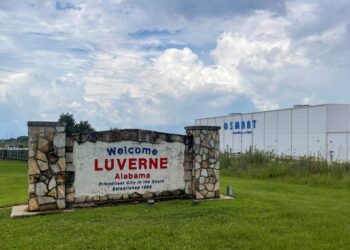 A welcome sign stands next to the SMART Alabama, LLC auto parts plant and Hyundai Motor Co. subsidiary.