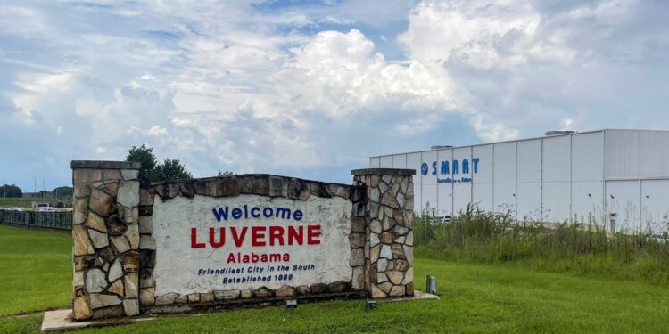 A welcome sign stands next to the SMART Alabama, LLC auto parts plant and Hyundai Motor Co. subsidiary.