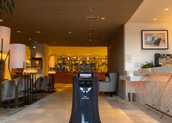 Alfred the robot in the hotel lobby.