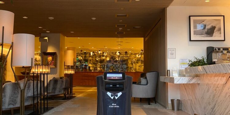 Alfred the robot in the hotel lobby.