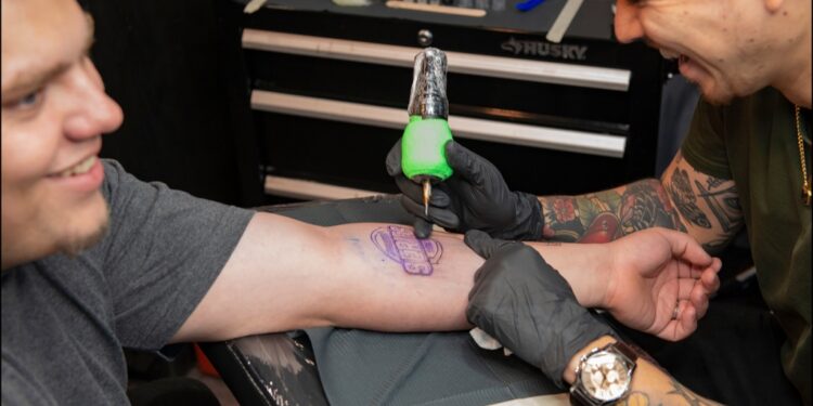 Subway gave out free subs for a year to eight other lucky fans who agreed to get inked.