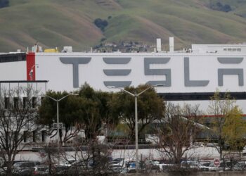 FILE PHOTO: The view of Tesla Inc's U.S. vehicle factory in Fremont, California, U.S., March 18, 2020. REUTERS/Shannon Stapleton/File Photo