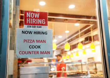 Jobless claims dip slightly despite signs of slowing economy