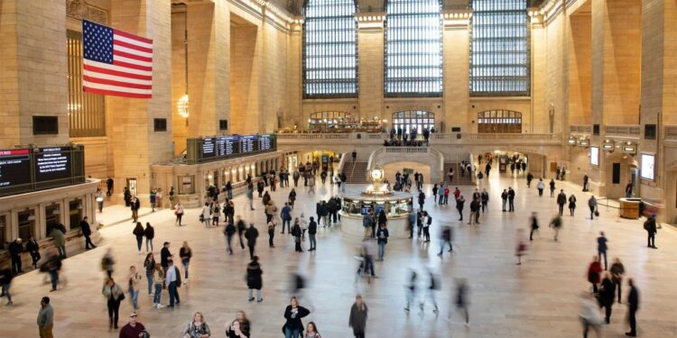 Commuters pass through Grand Central Terminal on March 10, 2020, in New York.