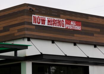 Restaurant's Now Hiring sign