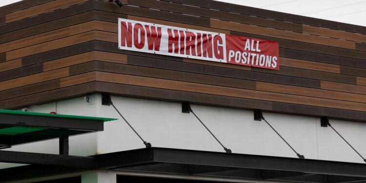 Restaurant's Now Hiring sign