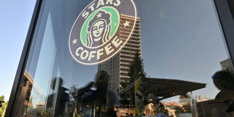 A logo of a newly opened Stars Coffee