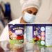 Tubs of ice-cream are seen as a labourer works at Ben & Jerry's factory in Be'er Tuvia, Israel