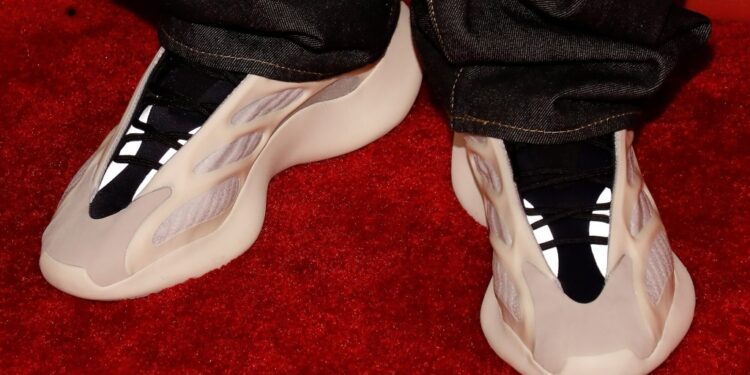 West is the owner and designer of the wildly popular sneaker line that includes the "Yeezy Boost 350."