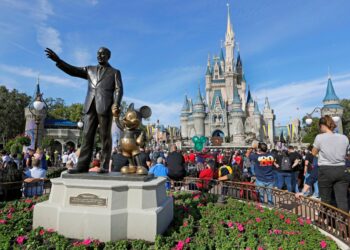 Disney World is being sued by two annual park passholders who say the park operator is using COVID-era restrictions to limit attendance.