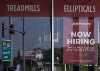 Jobless claims fell unexpectedly in still-tight labor market