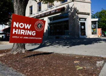 Jobless claims rise, but labor market remains tight
