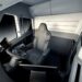 A 3-D interior view of Elon Musk's Tesla Semi electric commercial truck is displayed.