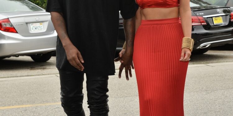 Ye is also alleged to have show staffers racy images of his estranged wife, Kim Kardashian.