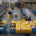 Workers select and pack items during Cyber Monday at the Amazon fulfilment center in Robbinsville Township, NJ.