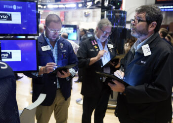 Dow surges after Fed hints at smaller rate hikes