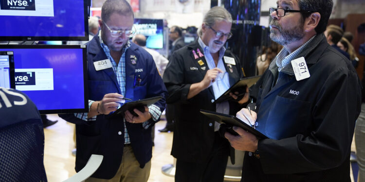 Dow surges after Fed hints at smaller rate hikes