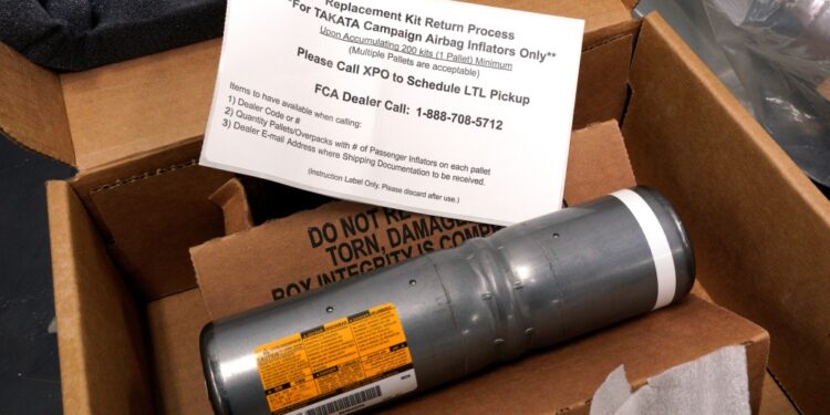 A replacement airbag inflator.