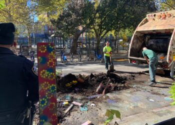 City workers tearing down the eatery.
