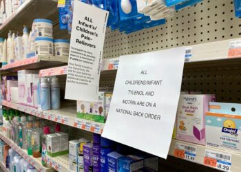 A sign is placed near the section for children's medicine, Sunday, Dec. 18, 2022 at a CVS in Greenlawn, N.Y.