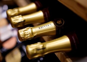 Bottles of Champagne are seen on display for sale in a wine shop in Paris.