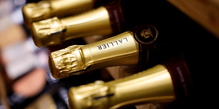 Bottles of Champagne are seen on display for sale in a wine shop in Paris.
