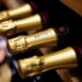 Bottles of Champagne are seen on display for sale in a wine shop in Paris.