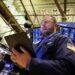 A trader works on the floor of the New York Stock Exchange Monday.