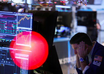 Dow tumbles more than 700 points on angst over hawkish Fed