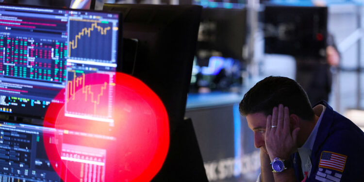 Dow tumbles more than 700 points on angst over hawkish Fed