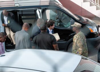 Sam Bankman-Fried leaving the Bahamas court in a black corrections van.