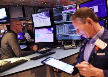 Dow jumps as December jobs report eases rate worries