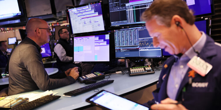 Dow jumps as December jobs report eases rate worries