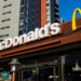 McDonald's aiming to build more stores but warns of layoffs