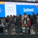 Travelers line up at the check-in counters for Southwest Airlines last week,