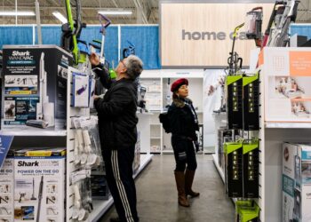 A shopper in a Bed Bath & Beyond store.