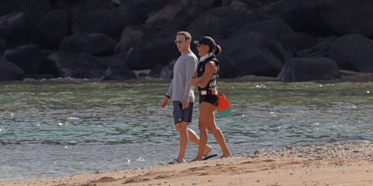 Meta has boosted spending on personal security for Mark Zuckerberg, pictured in Hawaii last year with his wife Priscilla Chan
