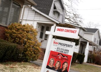 Sign showing a house under contract.